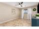 Comfortable bedroom with large window and tile floors, providing natural light and space at 8155 E Columbus Ave, Scottsdale, AZ 85251
