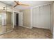 Bedroom featuring a large closet, and neutral color palette with tile floors at 8155 E Columbus Ave, Scottsdale, AZ 85251