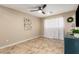 Comfortable bedroom with a large window and tile floors, providing natural light and space at 8155 E Columbus Ave, Scottsdale, AZ 85251