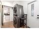 Laundry room features a full sized washer and dryer next to an exterior door at 8155 E Columbus Ave, Scottsdale, AZ 85251