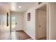 Bright entryway featuring neutral walls, tile flooring, and direct access to the front door at 8355 E Vía De Los Libros --, Scottsdale, AZ 85258