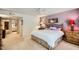 Main bedroom with ceiling fan, and access to the main bathroom at 8355 E Vía De Los Libros --, Scottsdale, AZ 85258
