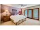 Main bedroom with ceiling fan, and private entrance at 8355 E Vía De Los Libros --, Scottsdale, AZ 85258