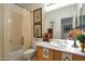 Cozy bathroom with a vanity, a sink, and decorative accents at 9038 E Calle De Valle Dr, Scottsdale, AZ 85255