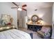 Cozy bedroom featuring a vaulted ceiling, carpet flooring, and stylish decor at 9038 E Calle De Valle Dr, Scottsdale, AZ 85255