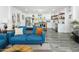 Bright living room with open kitchen, comfortable seating, and stylish decor at 912 E Orchid Ln, Phoenix, AZ 85020