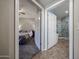 This entryway offers entry to the primary bedroom and bathroom at 10030 W Indian School Rd # 101, Phoenix, AZ 85037