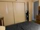 Bedroom with a single bed, built-in closet, and a simple decor at 120 N Val Vista Dr # 196, Mesa, AZ 85213