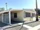 Charming single-story home with a covered entrance and well-maintained gravel landscaping at 120 N Val Vista Dr # 196, Mesa, AZ 85213