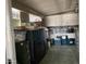 Storage room with shelving, totes, storage containers, an area rug, and an overhead light at 120 N Val Vista Dr # 196, Mesa, AZ 85213