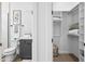 Modern bathroom with a toilet and vanity, conveniently located next to the closet at 12746 E Casitas Del Rio E Dr, Scottsdale, AZ 85255