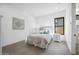 Bright bedroom with a comfortable bed, stylish nightstands, and a modern window at 12746 E Casitas Del Rio E Dr, Scottsdale, AZ 85255