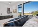 Inviting bedroom view highlighting mountain views, modern decor, and a convenient beverage center at 12746 E Casitas Del Rio E Dr, Scottsdale, AZ 85255