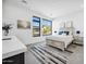 Bright bedroom featuring large windows with mountain views, stylish decor, and modern finishes at 12746 E Casitas Del Rio E Dr, Scottsdale, AZ 85255