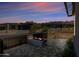 Stunning desert residence featuring an outdoor fireplace on the patio, perfect for relaxing and entertaining at 12746 E Casitas Del Rio E Dr, Scottsdale, AZ 85255