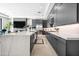 Bright, open kitchen with modern appliances, large island, and seamless integration to the living area at 12746 E Casitas Del Rio E Dr, Scottsdale, AZ 85255