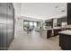 Bright and airy living space featuring tile flooring, a stylish dining area and a well-equipped kitchen at 12746 E Casitas Del Rio E Dr, Scottsdale, AZ 85255