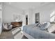 Well-lit main bedroom featuring a modern style, comfortable seating, and ample natural light at 12746 E Casitas Del Rio E Dr, Scottsdale, AZ 85255