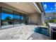 Outdoor patio with pavers and mini-pool, featuring outdoor seating and grilling area at 12746 E Casitas Del Rio E Dr, Scottsdale, AZ 85255