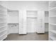 Spacious walk-in closet with custom white shelving and ample storage space at 12746 E Casitas Del Rio E Dr, Scottsdale, AZ 85255