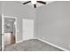 Bedroom featuring neutral walls, plush carpet, ceiling fan, and a closet at 1332 W Blue Ridge Ct, Chandler, AZ 85248