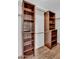 Custom closet with dark wood shelving and ample hanging space provides an organized storage solution at 1332 W Blue Ridge Ct, Chandler, AZ 85248