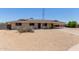 Single story home featuring a large covered carport and desert landscaping at 1351 E Ellis Cir, Mesa, AZ 85203