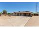 Single story home featuring a large covered carport and desert landscaping at 1351 E Ellis Cir, Mesa, AZ 85203