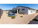 Enjoy this spacious backyard with a trampoline and gravel landscaping at 1360 E Avenida Kino --, Casa Grande, AZ 85122