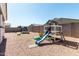 Enjoy outdoor fun in this backyard featuring a slide and a trampoline at 1360 E Avenida Kino --, Casa Grande, AZ 85122