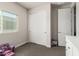 Bedroom featuring a sliding closet, plush carpet, and natural light creating a comfortable space at 1360 E Avenida Kino --, Casa Grande, AZ 85122