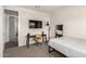 This bedroom offers a desk, mirror and a bed at 1360 E Avenida Kino --, Casa Grande, AZ 85122