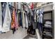 Walk-in closet featuring ample storage with organized hanging space and shelving for accessories and clothes at 1360 E Avenida Kino --, Casa Grande, AZ 85122