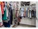 Walk-in closet with ample hanging space, built-in shelves, and an organized shoe rack for storage at 1360 E Avenida Kino --, Casa Grande, AZ 85122