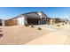 Single-story home featuring a modern garage door, low-maintenance landscaping, and neutral color palette at 1360 E Avenida Kino --, Casa Grande, AZ 85122