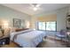 A bedroom showcases warm natural light, and neutral colors that create a serene retreat at 1401 E Drake Dr, Tempe, AZ 85283