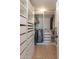 Organized walk-in closet with custom shelving, drawers, and ample storage space at 1401 E Drake Dr, Tempe, AZ 85283