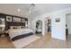 Spacious main bedroom featuring dark wall, a ceiling fan, and a walk-in closet at 1401 E Drake Dr, Tempe, AZ 85283