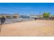 Large backyard with chain link fence and mountain views in the distance at 1526 W North Ln, Phoenix, AZ 85021