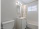 Bathroom features white vanity, framed mirror, subway tile and shower with floral curtain at 1526 W North Ln, Phoenix, AZ 85021
