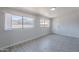 Inviting bedroom with neutral walls, modern tile floors and natural light at 1526 W North Ln, Phoenix, AZ 85021