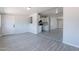 Open-concept living space featuring tile flooring and seamless access to the kitchen at 1526 W North Ln, Phoenix, AZ 85021