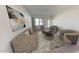 Cozy living room with neutral furniture, artwork, and a soft rug for a comfortable space to relax at 15504 W Corte Del Sol Este --, Waddell, AZ 85355