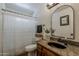 Bathroom with dark fixtures and granite countertops at 16426 S 29Th St, Phoenix, AZ 85048