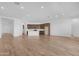 Spacious living area with an open kitchen and plenty of room for entertaining and relaxation at 17051 W West Wind Dr, Surprise, AZ 85387