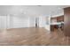 Expansive living space with an open kitchen area, perfect for modern living and gatherings at 17051 W West Wind Dr, Surprise, AZ 85387