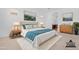 Virtually staged main bedroom features a calming aesthetic with soft colors, stylish furniture, and serene wall art at 17051 W West Wind Dr, Surprise, AZ 85387
