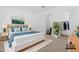 Comfortable main bedroom with ensuite bathroom and spacious closet at 17051 W West Wind Dr, Surprise, AZ 85387