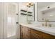 Elegant bathroom with a double vanity, modern fixtures, and stylish shelving at 1959 E Orion St, Tempe, AZ 85283