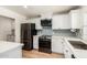 Bright kitchen with stainless steel appliances, quartz countertops and new cabinetry at 1959 E Orion St, Tempe, AZ 85283